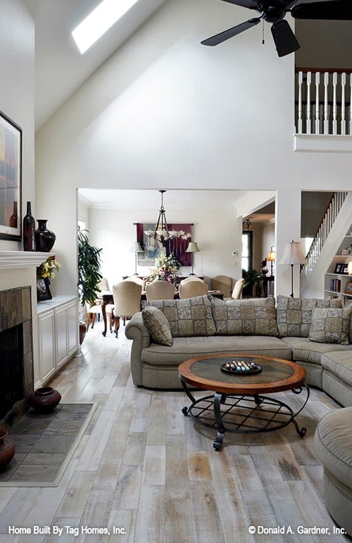 Inviting Living Space with Sunlit Ambiance and Bright Dining Nook