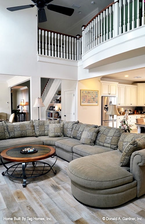 Inviting Living Room with High Ceiling Elegance
