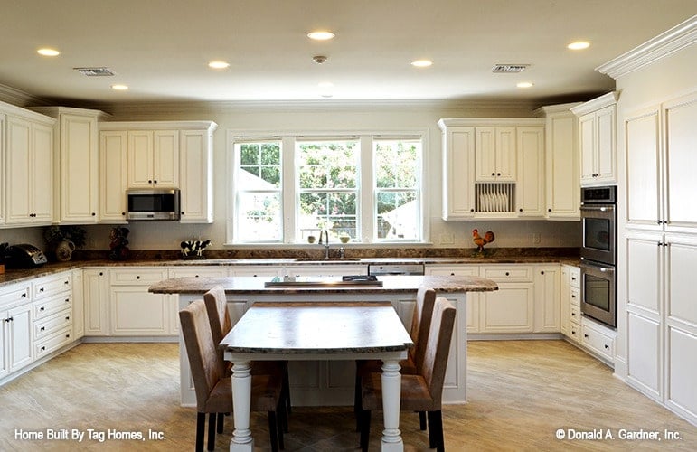Bright Kitchen with Elegant White Cabinetry and Central Island