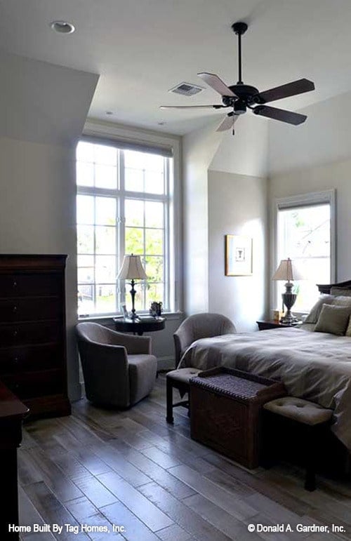 Inviting Bedroom with Spacious Window and Cozy Seating