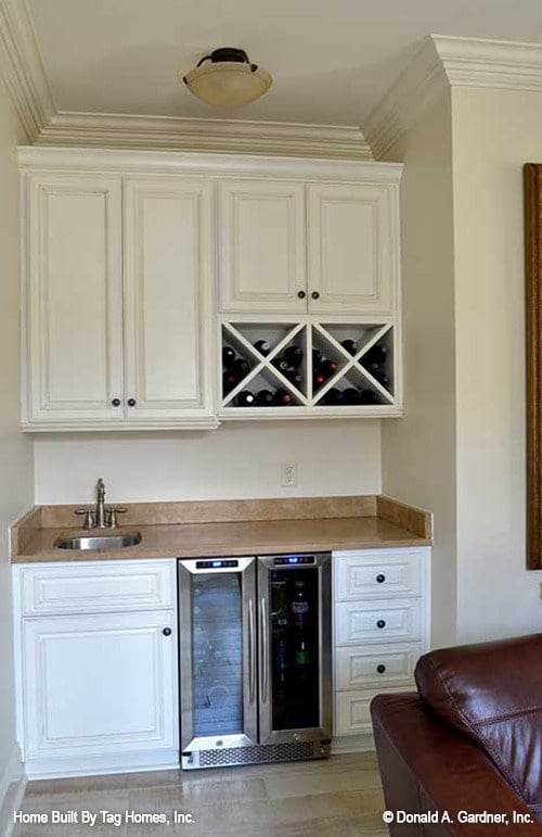 Elegant Home Bar with Wine Storage and Dual Mini-Fridges