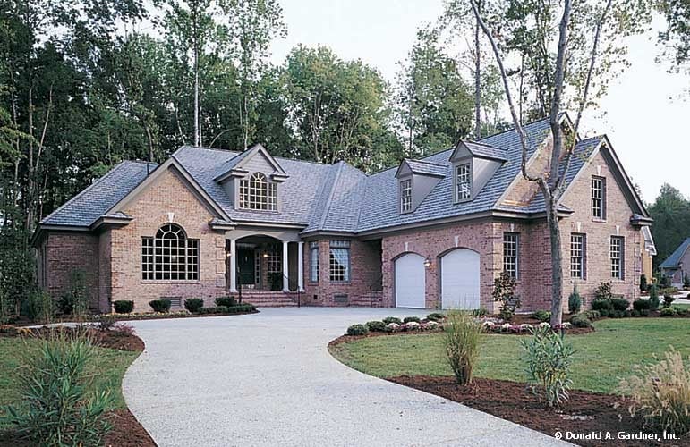 Charming Brick House with Elegant Architectural Features