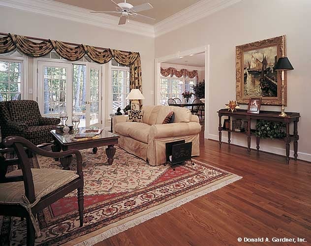 Charming Living Room with French Doors and Natural Light
