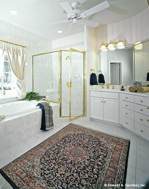 Spacious Bathroom with Elegant Soaking Tub and Double Vanity