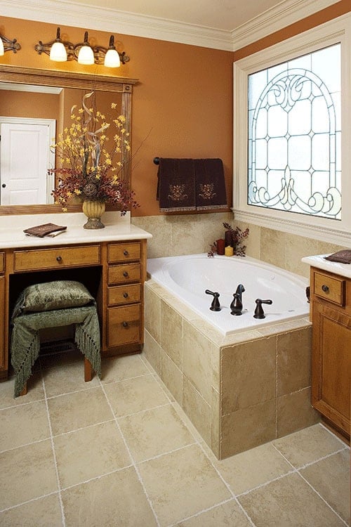 Earth-Toned Bathroom with Functional Storage and Privacy Features