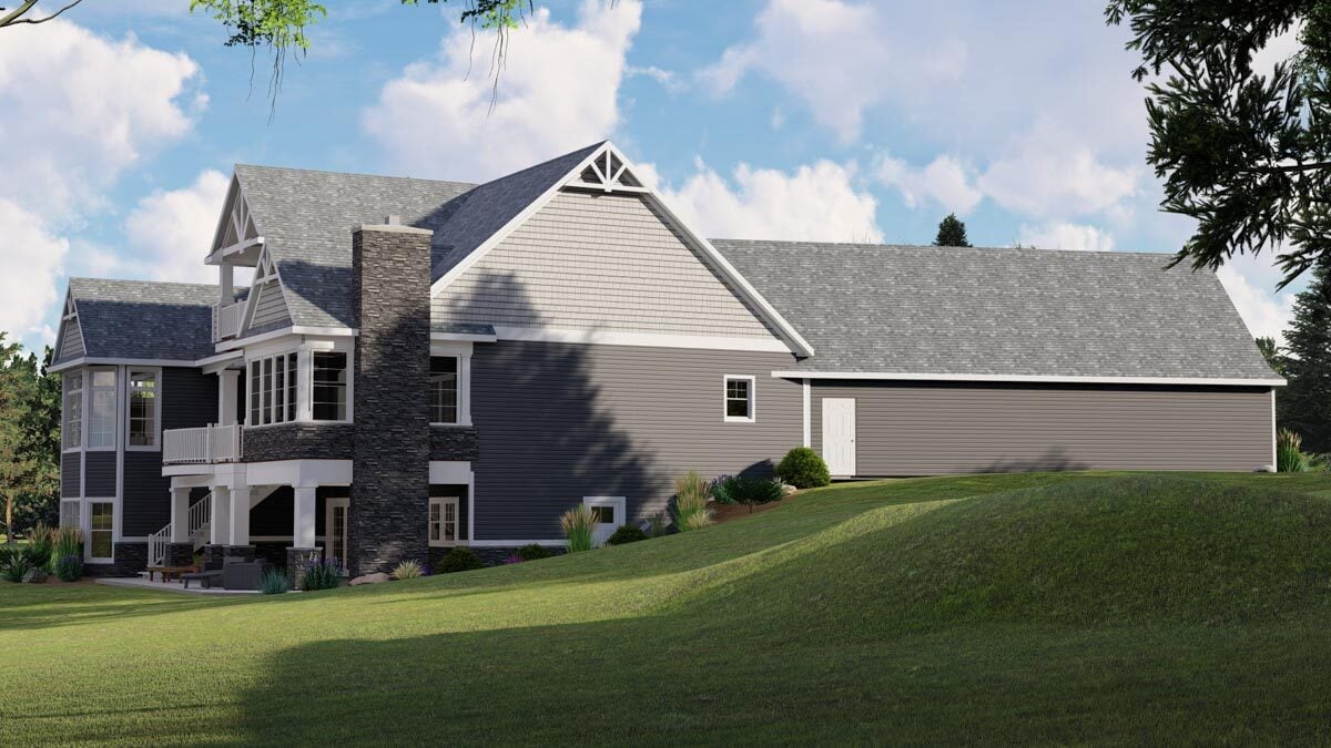 Two-Story House with Gabled Roof and Stone Chimney