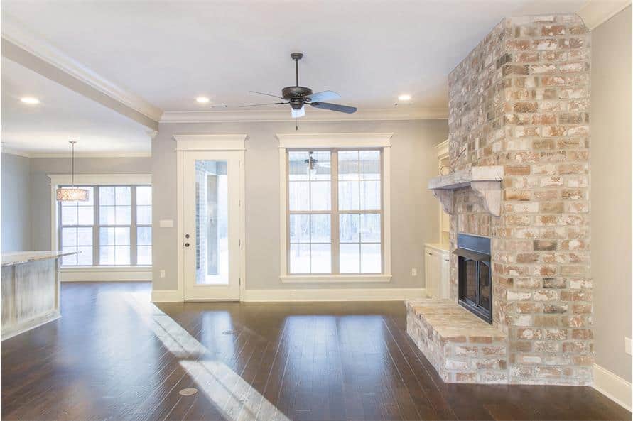 A glass door off the living room leads out to a covered porch.