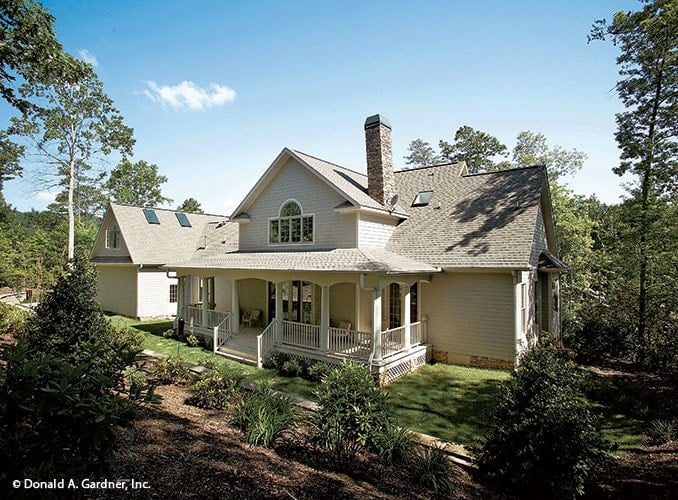 The rear porch includes an expansive covered porch complemented with a stoop.