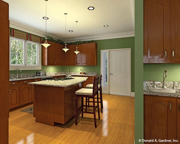 The kitchen includes outdoor access via a white door.
