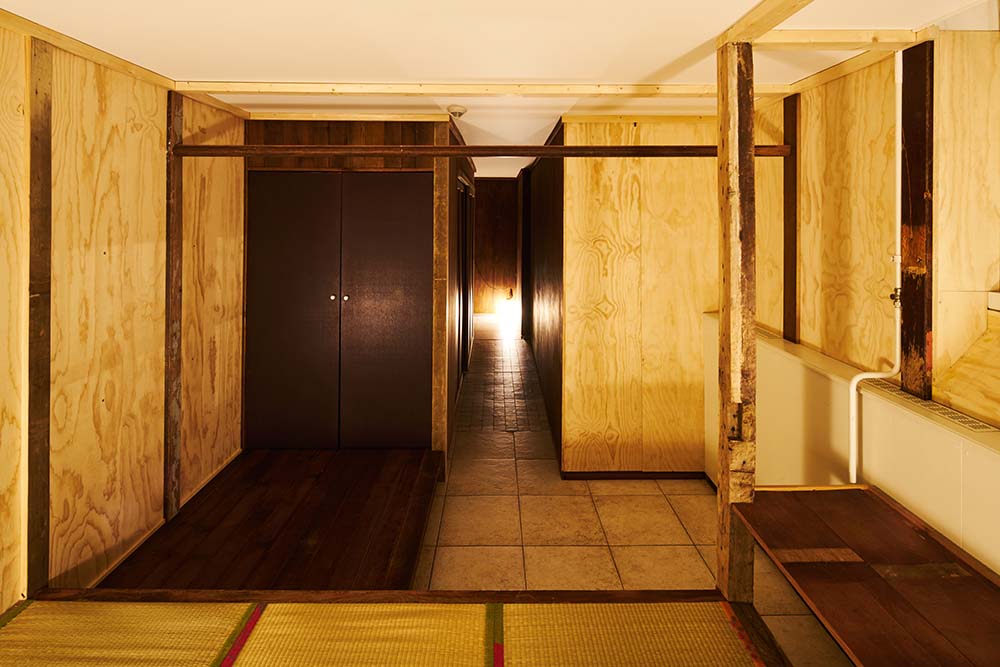 This is a look at the main door and hallway from the vantage of the wooden platform.