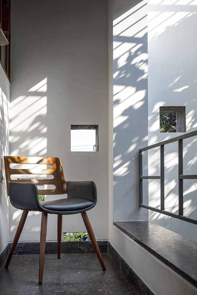 This is a close look at one of the balconies of the house fitted with a comfortable chair to better enjoy the landscape.