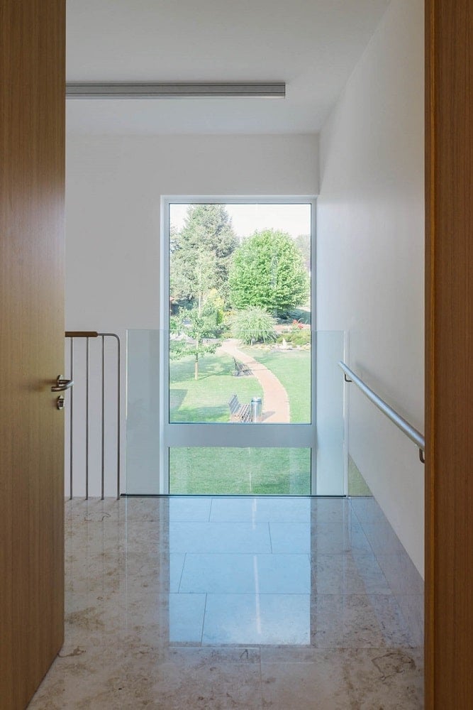 This is a look at the landing and indoor balcony from the vantage of one of the rooms.