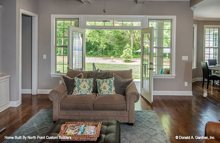 A french door at the back opens to a covered porch.