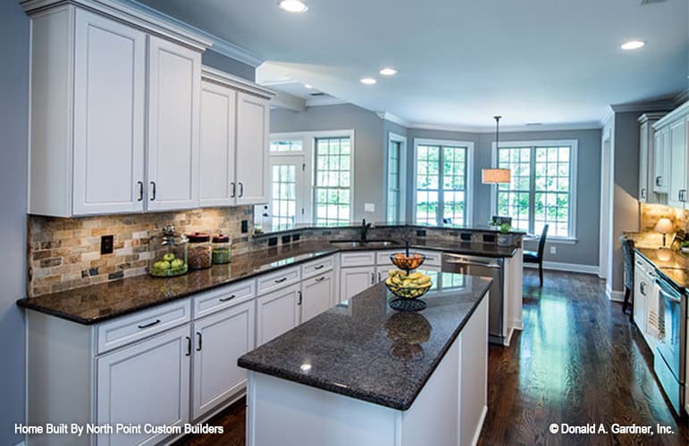 White framed windows bring ample natural light to the interior.