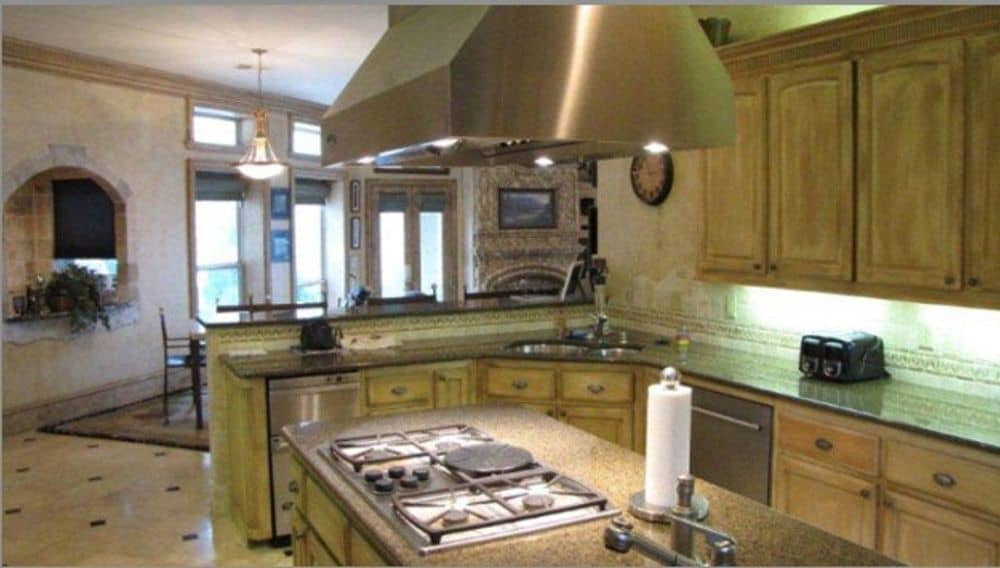 Corner sink and built-in cooktop complete the kitchen.