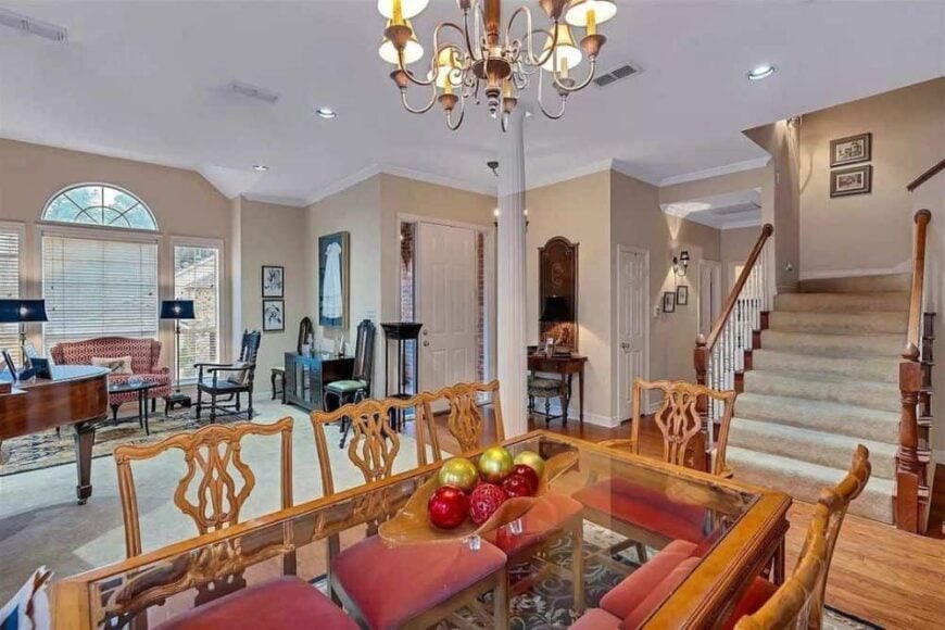 An open layout view showing the foyer, living room, and dining area.
