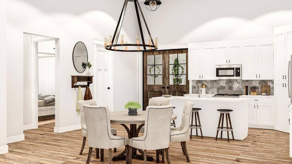 Dining area with 5-seater dining set illuminated by a round chandelier.