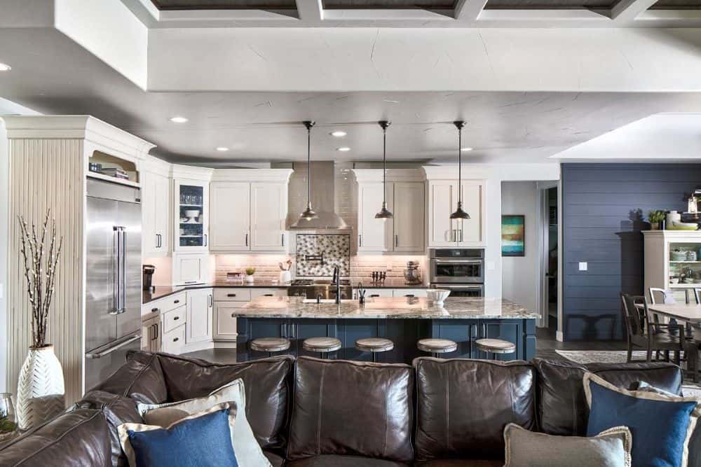 The great room opens completely to the kitchen and dining room.