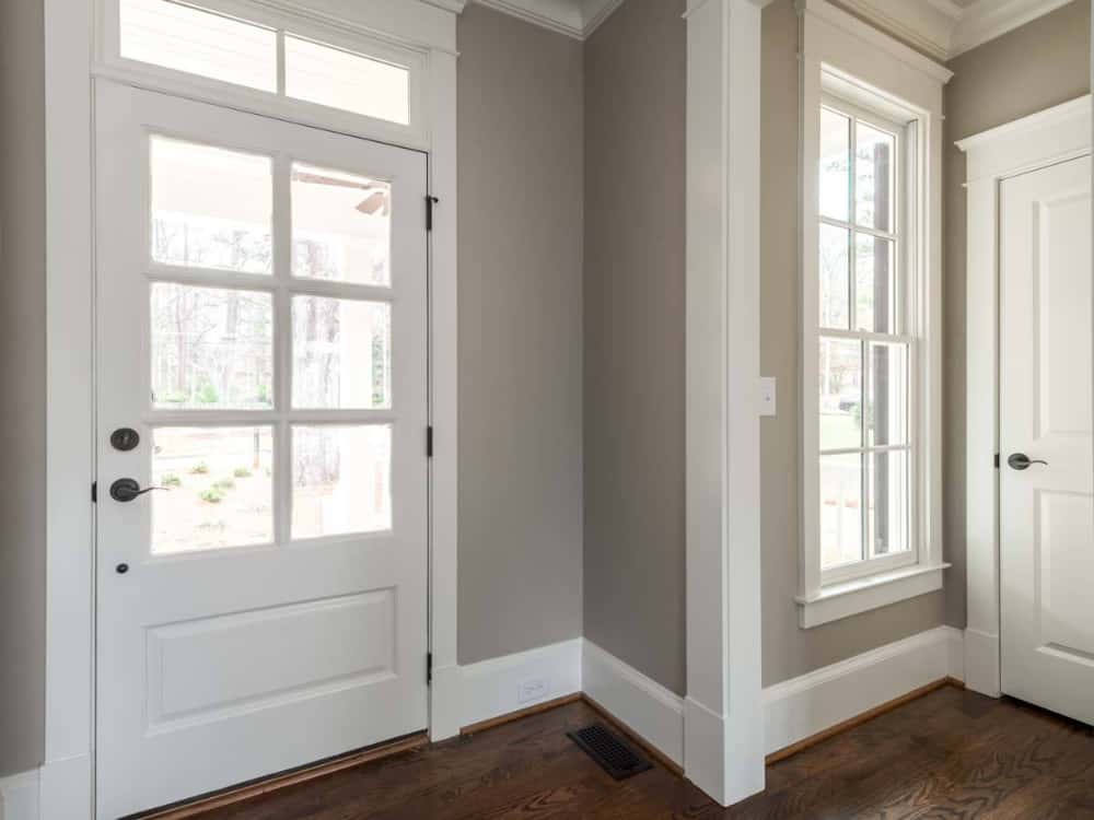 Across the dining room is a white door that takes you to the powder room.