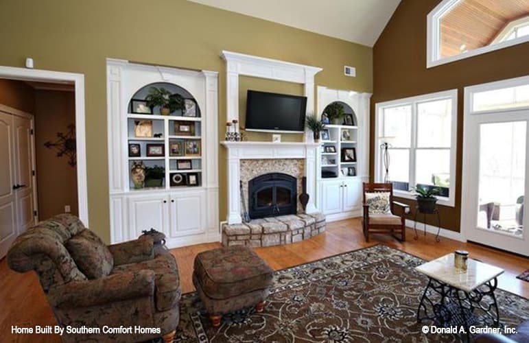 Large windows flood the great room with natural light.