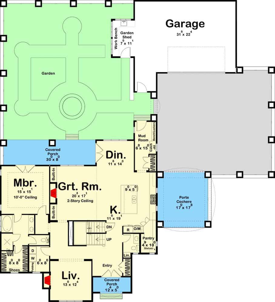 Main level floor plan of a two-story 4-bedroom French country home with foyer, living room, kitchen, great room, dining area, primary suite, mudroom, and plenty of outdoor space.
