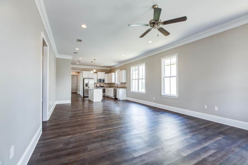 The living room opens completely to the dining area and kitchen.