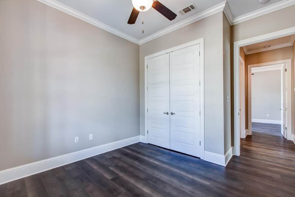 A walk-in pantry concealed behind the double doors completes the kitchen.