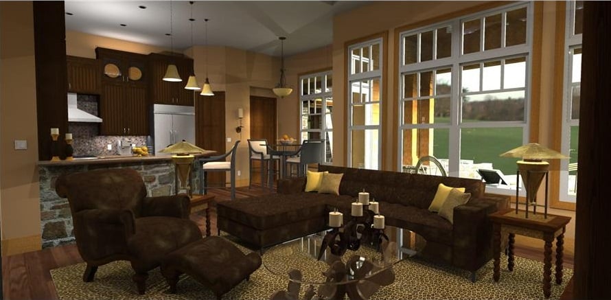 Family room with cozy brown seats and wooden tables sitting on a patterned area rug.