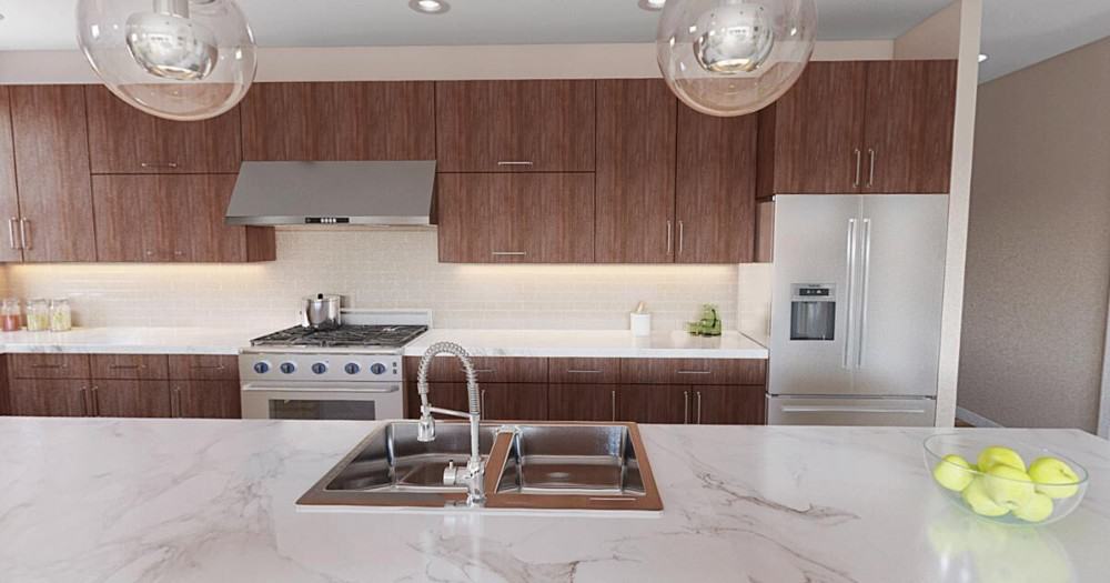 A closer look at the marble top island fitted with a double bowl sink and a gooseneck faucet.