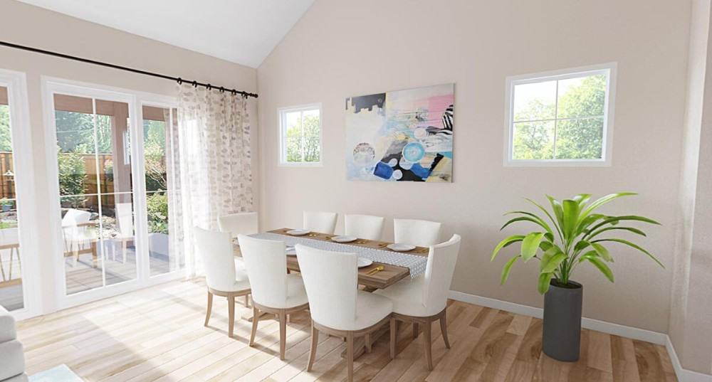 Dining room with a rectangular dining set, a fresh potted plant, and a lovely artwork gracing the beige walls.