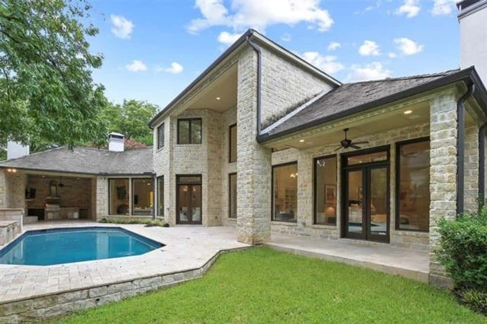 A summer kitchen situated at the covered porch completes the veranda.