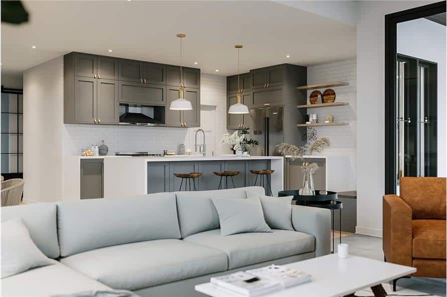 Living room with a brown armchair and a gray sectional paired with a modern coffee table.