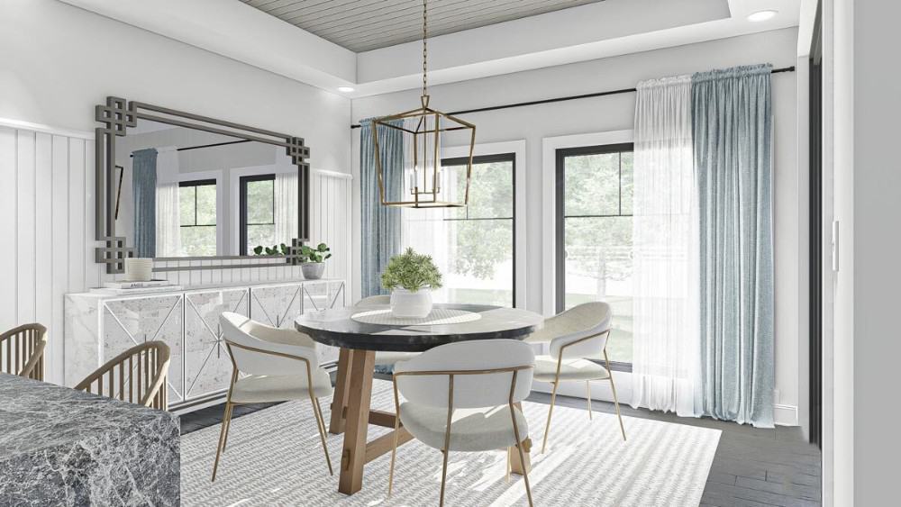 Dinette with a marble buffet table, a caged chandelier, and a round dining table sitting on a patterned area rug.