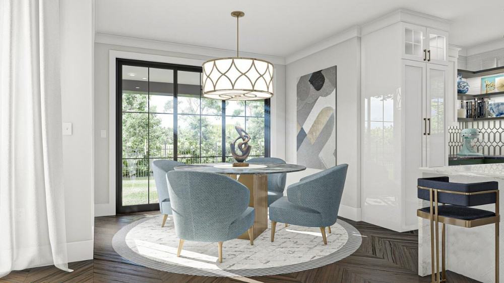 Breakfast nook with a stylish drum pendant and round dining set sitting on a round area rug.