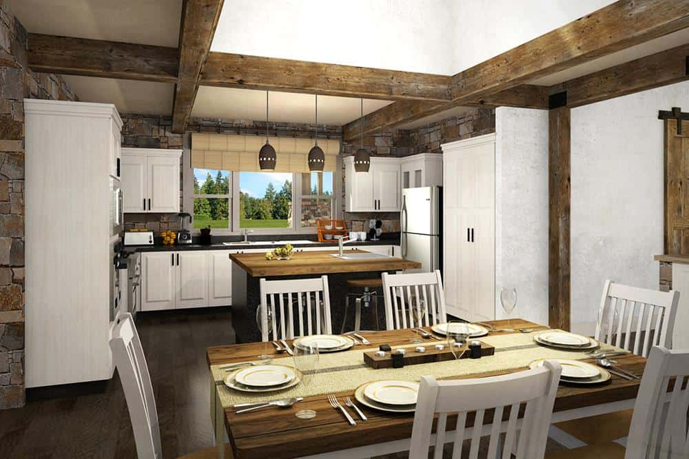 Combined kitchen and dining area with beamed ceiling, white cabinetry, slate appliances, a breakfast island, and a 6-seater dining set.