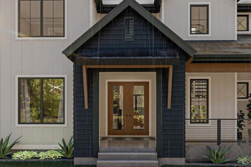 Covered front porch with a gabled entry, a concrete stoop, and a french front door.