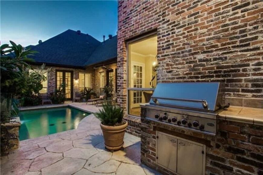 A summer kitchen completes the outdoor lounge.