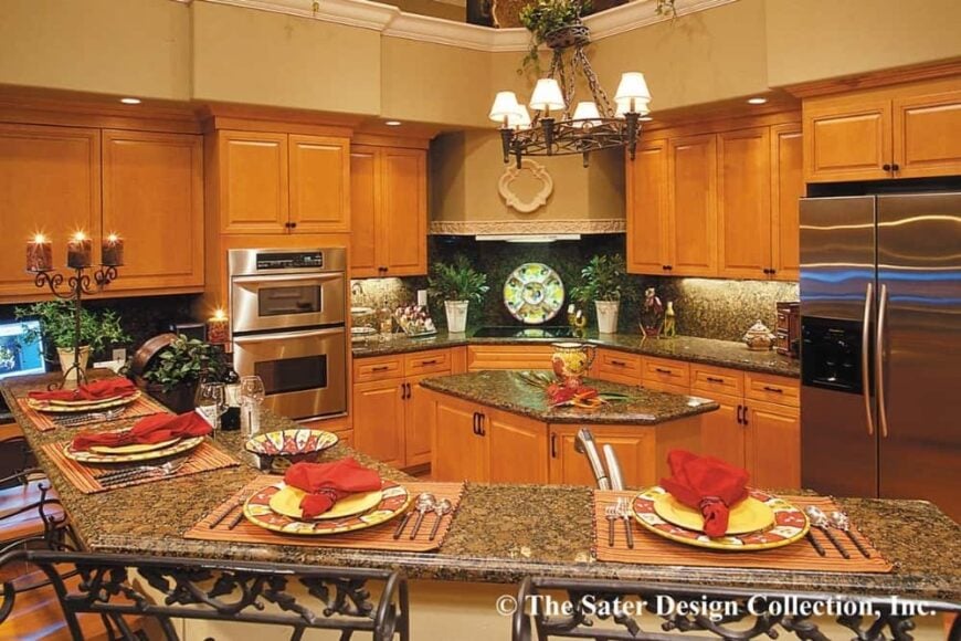 The kitchen has granite countertops, wooden cabinetry, a center island, and a breakfast bar.