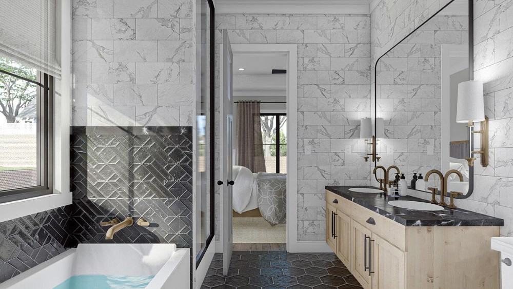 The primary bathroom is equipped with a walk-in shower, a dual sink vanity, and a drop-in bathtub accentuated with a decorative black tiled backsplash.