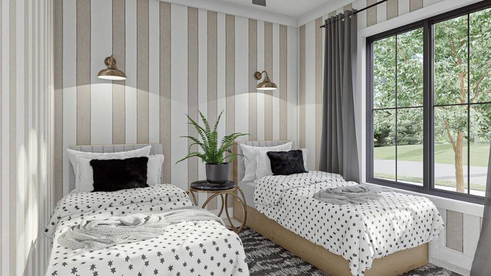 This bedroom offers two single beds illuminated with brass sconces.