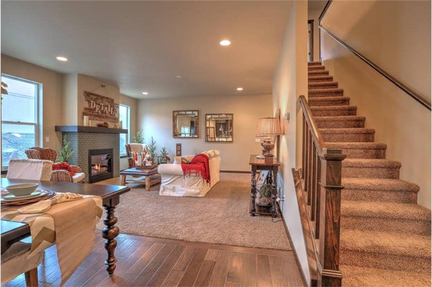 A carpeted staircase off the great room leads to the upstairs bedrooms.