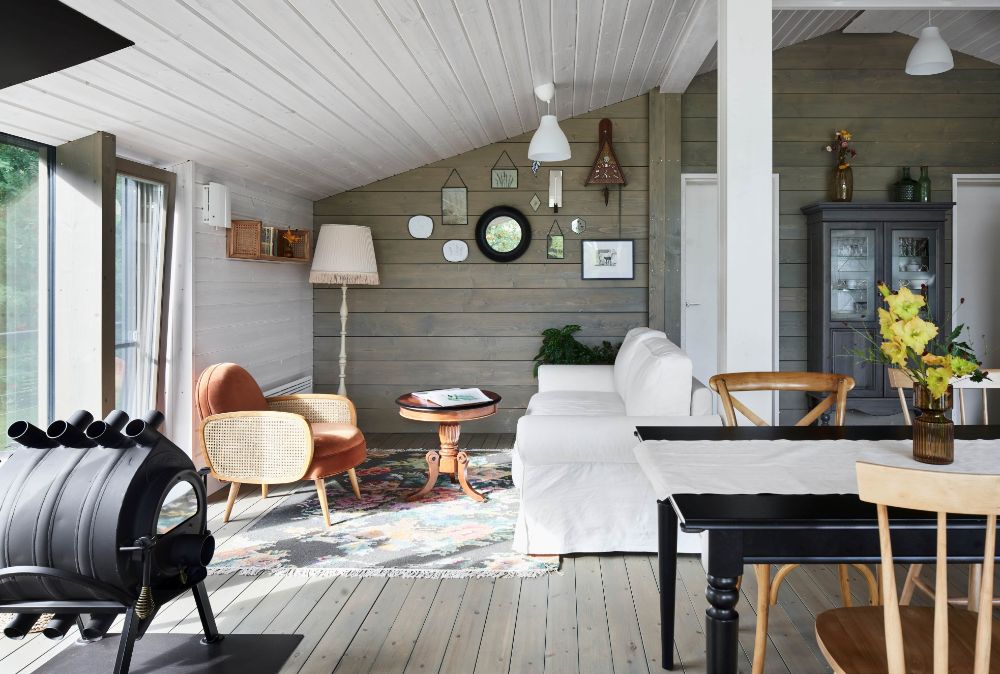 Modular house on slope living area connected to kitchen.