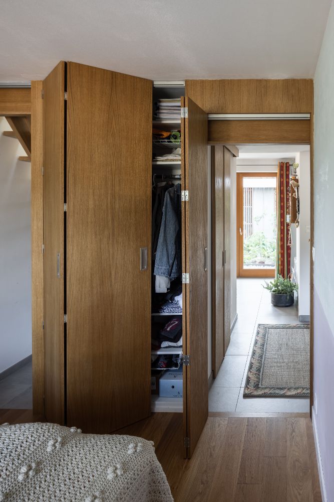 Bedroom area with folding door closet and main door.