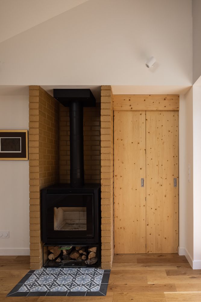 Wooden stove in the main entrance that keeps the area warm.