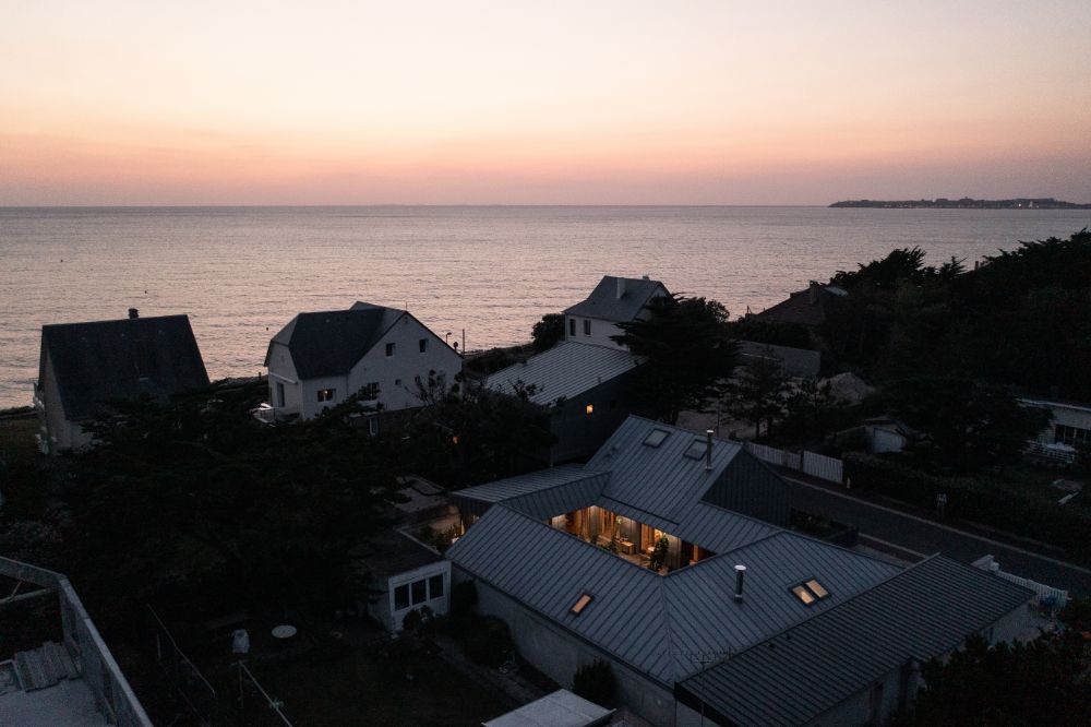 Featured images of the beach houses during night.