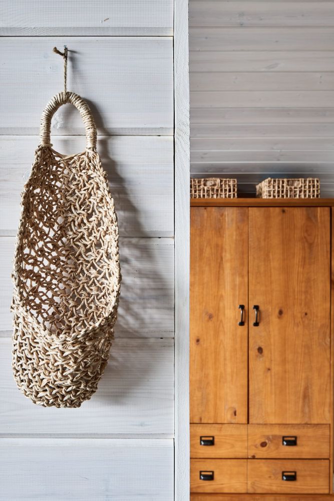 Modular house on slope cabinet with bag.