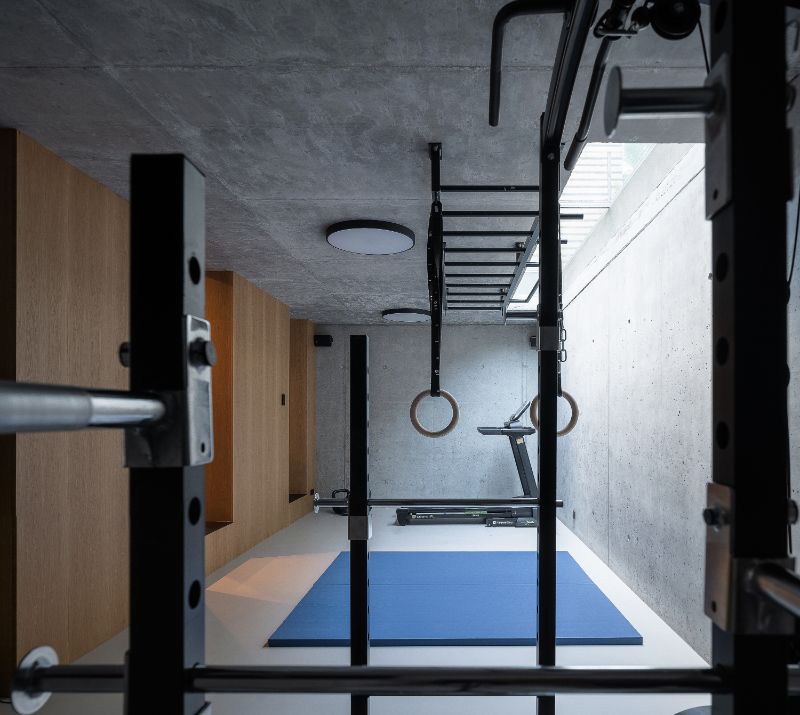 Cherry tree house mini gym with gym equipment.