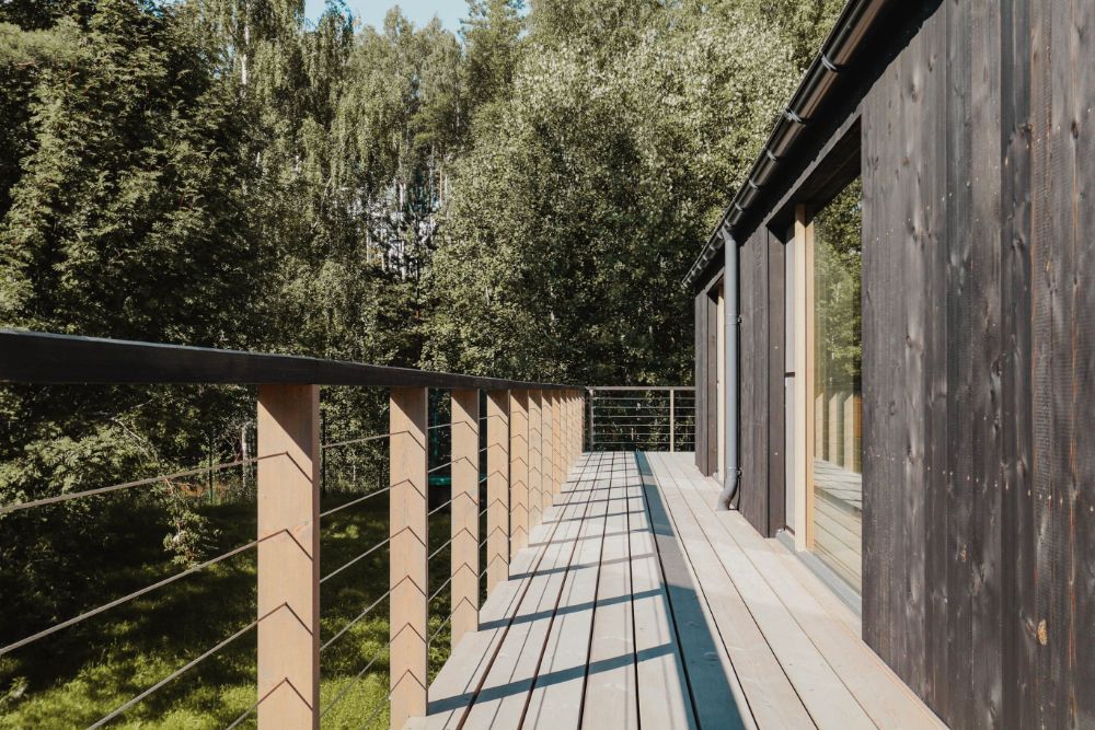Modular house on slope balcony side.