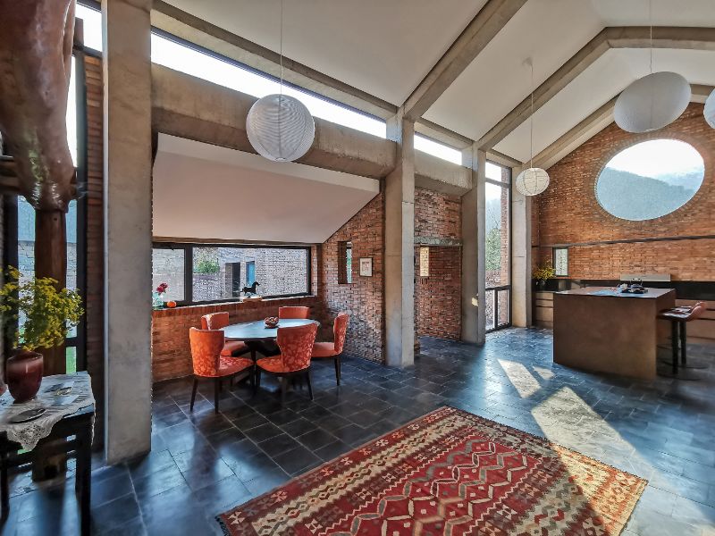 Yanqing residential house open kitchen, entry, and dining area.