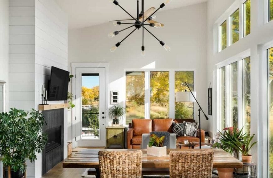 Surrounding windows bathe the combined dining and living room with an abundant amount of natural light.